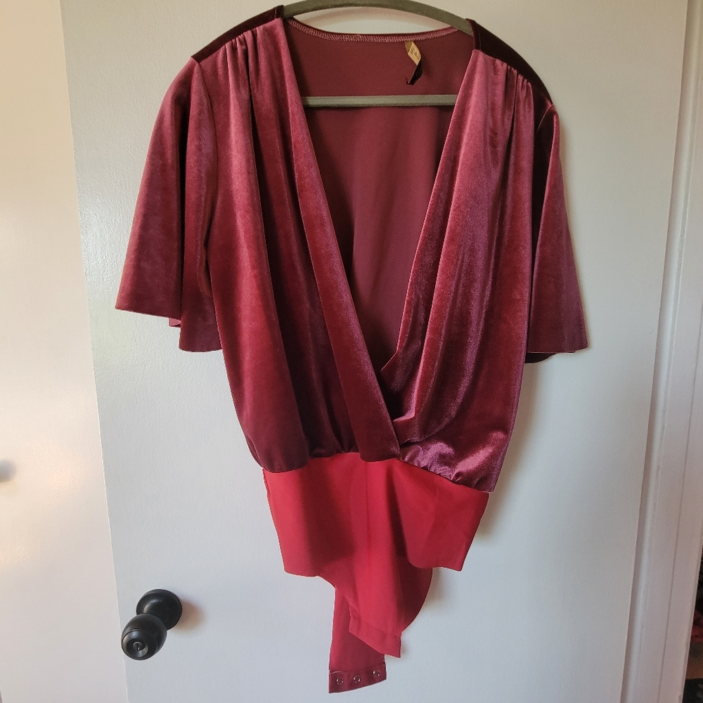 Velvet Rasberry color, body suit open neck. Medium